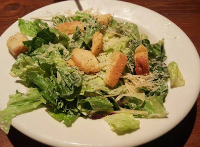 Caesar salad photo of Johnny Carino's