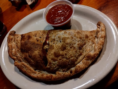 Calzone photo of Moosejaw Pizza & Dells Brewing Co.